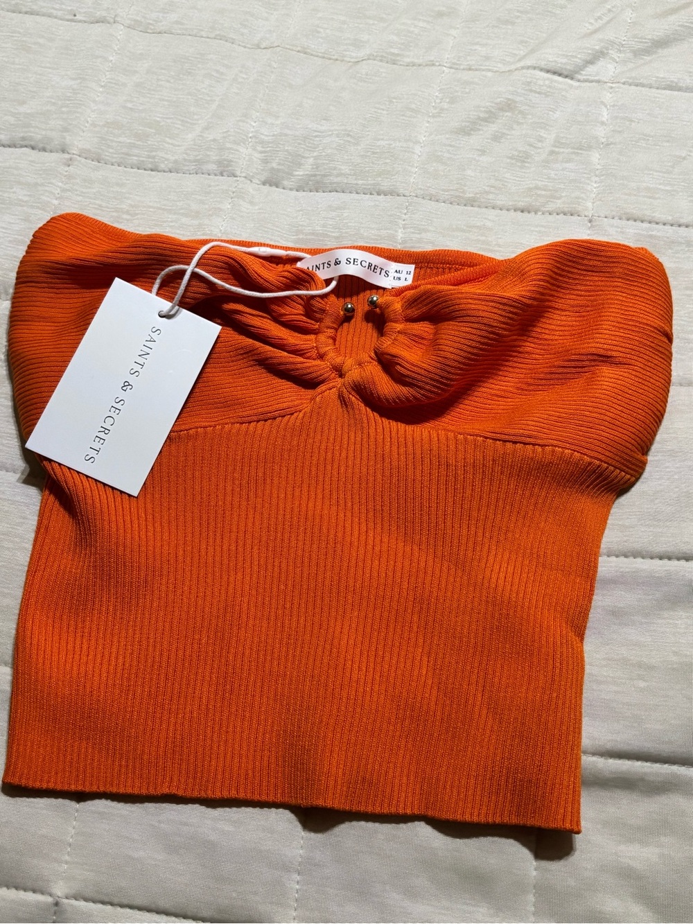 Saints & Secrets Orange Ribbed Strapless Knot-Front Crop Top
